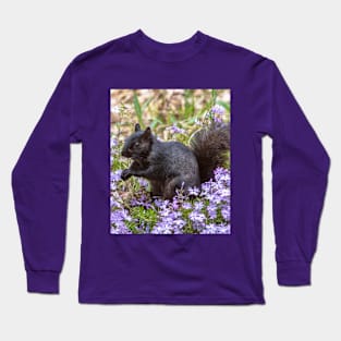 Black squirrel in a field of purple flowers Long Sleeve T-Shirt